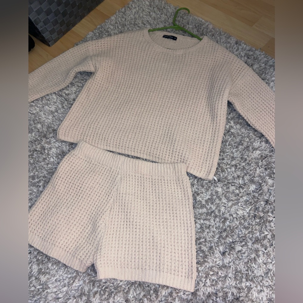 Beige shorts set.
